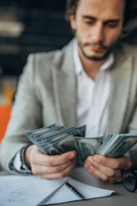 man giving money for bail bond