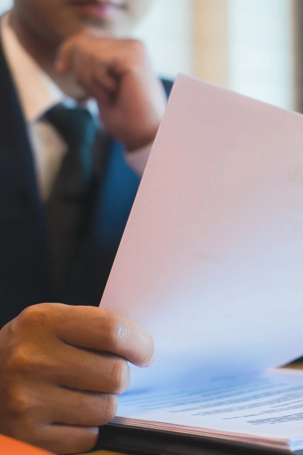 man with legal papers